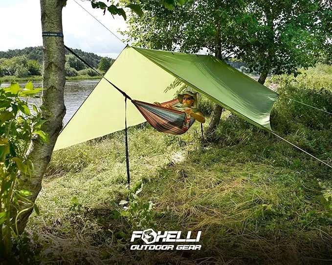 Foxelli Hammock Rain Fly - Waterproof Lightweight Tent & Hammock Rain Tarp for Camping, Backpacking w/Easy Setup Including Extra Long Guy Lines & Stakes