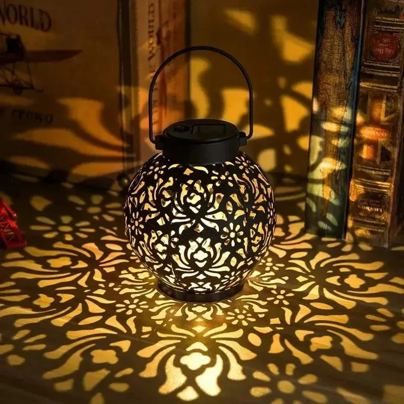 LED Solar Hanging Lantern – Hollow Iron Projection Light for Garden & Yard Decor