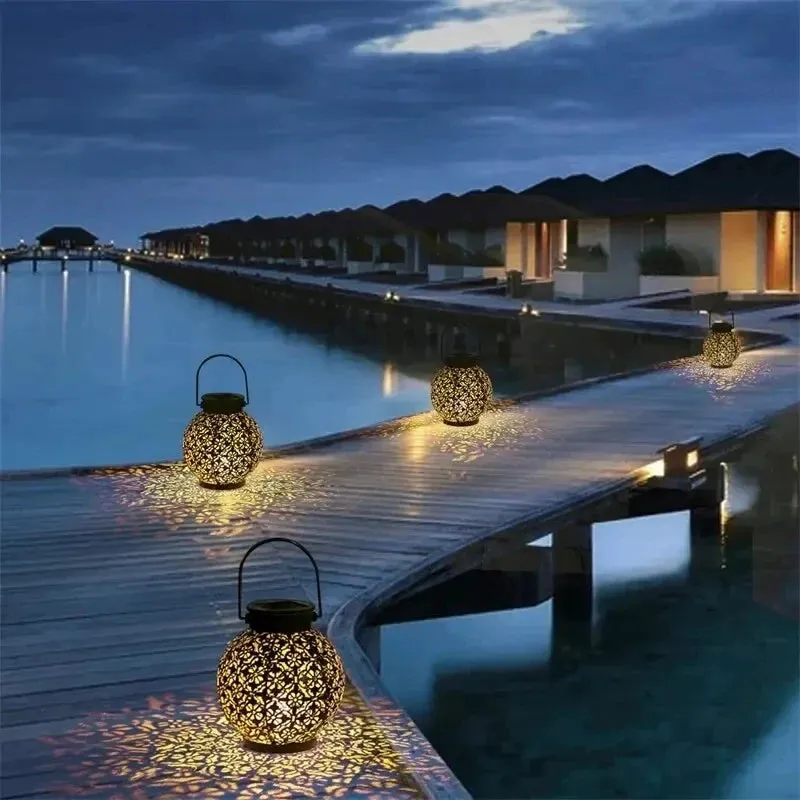 LED Solar Hanging Lantern – Hollow Iron Projection Light for Garden & Yard Decor