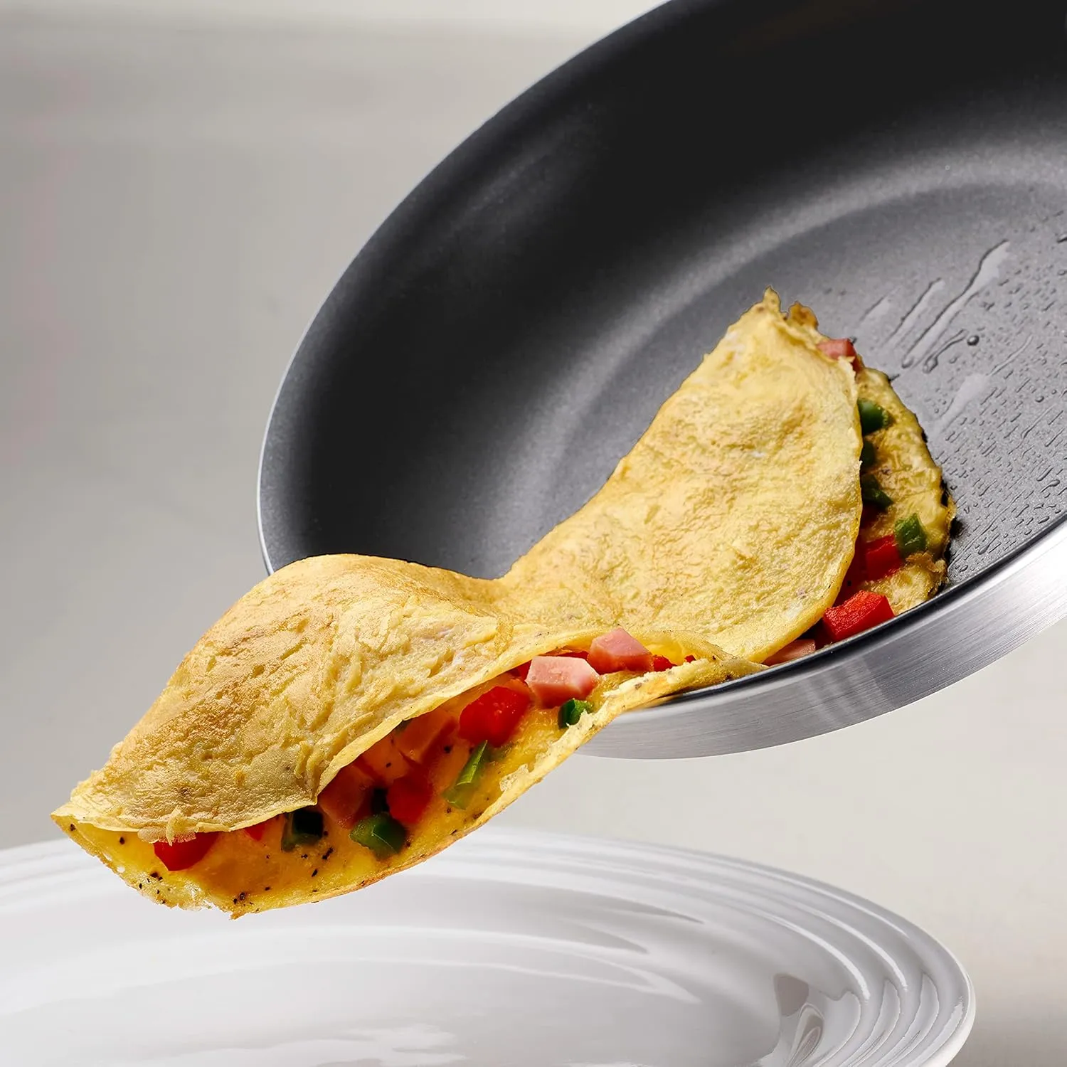 Tramontina Professional Fusion 10-Inch Non Stick Frying Pan, Heavy-Gauge Aluminum Skillet with Reinforced Nonstick Coating, Dishwasher and Oven Safe
